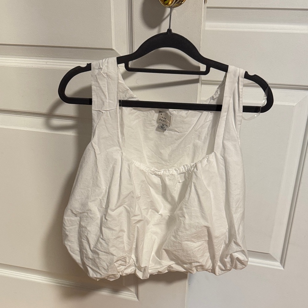a new day White Tank Top
